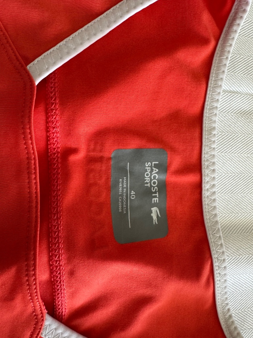 Burnt orange Lacoste tennis shirt